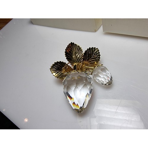 261 - A pretty unused Swarovski crystal strawberry formed brooch which includes 2 large Swarovski crystal ... 