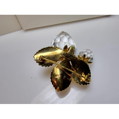 261 - A pretty unused Swarovski crystal strawberry formed brooch which includes 2 large Swarovski crystal ... 