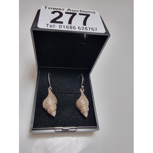 277 - A pair of 925 silver shell formed drop earrings in excellent clean condition, 2.5cm drop, marked 925... 