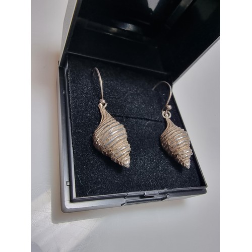 277 - A pair of 925 silver shell formed drop earrings in excellent clean condition, 2.5cm drop, marked 925... 