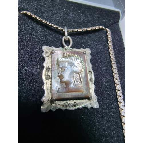 285 - A 925 silver pendant inset with a portrait of a Roman warrior carved out of mother of pearl, set on ... 