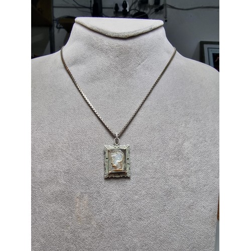 285 - A 925 silver pendant inset with a portrait of a Roman warrior carved out of mother of pearl, set on ... 