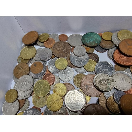 294 - A box containing a large quantity of various vintage coins from around the world.