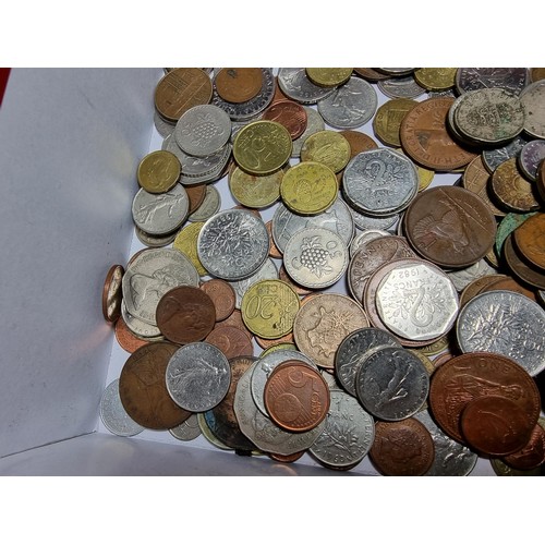 294 - A box containing a large quantity of various vintage coins from around the world.