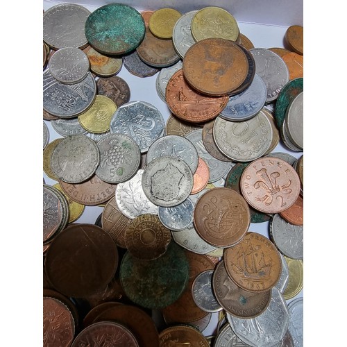 294 - A box containing a large quantity of various vintage coins from around the world.