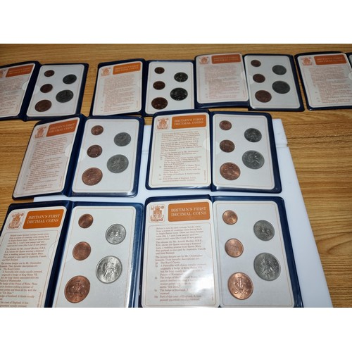 296 - A large bundle of 10x vintage Britain's first decimal coin sets, all in their wallets.