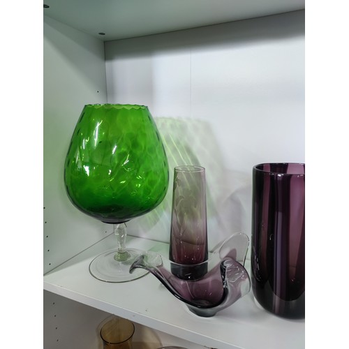 112 - Quantity of glassware inc art glass vases, bowls, large goblets, dog formed bottle opener etc along ... 