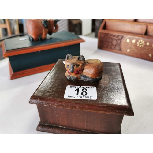 18 - 4x wooden items including letter rack and 3 lidded boxes 2 with figures on top and elephant and a mo... 