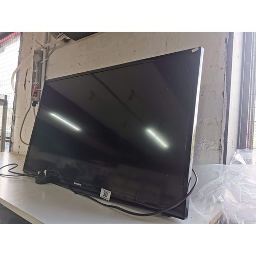 30 - Wall mounted flat screen Samsung 32