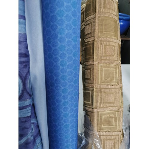 31 - Large quantity of 6x rolls of various fabric inc green floral design, 2x blue design rolls, brown sq... 