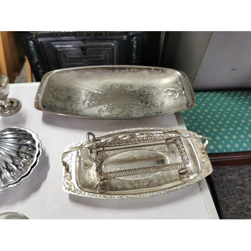 36 - Large quantity of plated ware inc scallop blue glass lined dishes, serving trays, butter dome, cruet... 