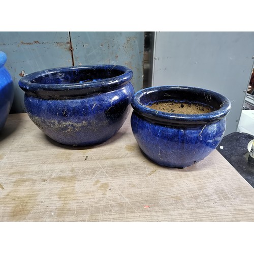 53 - Very large blue glazed terracotta planter along with 2x graduated dark blue terracotta planters, lar... 