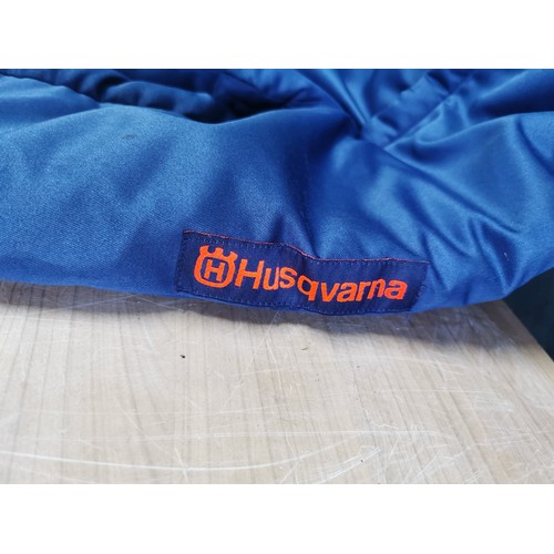 60 - Pair of Husqvarna expandable waist blue heavy duty chainsaw trousers