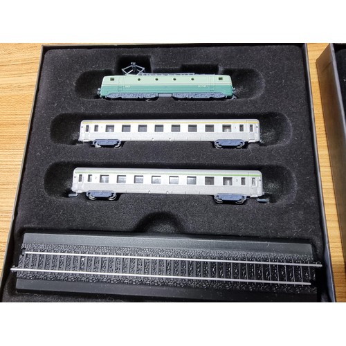 138 - A set of 4x as new N gauge mini train sets for display only by Atlas editions to include The Flying ... 