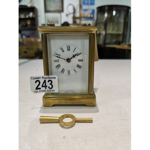 234 - Good quality early vintage brass carriage clock with a visible escapement to the top bevel edge glas... 