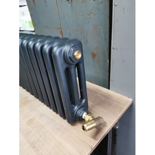 62 - Good quality black vintage style radiator complete with brackets in good order height 31cm length 14... 