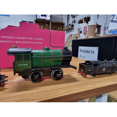 203 - A box full of various oo gauge model railway items to include 4 complete locomotives, including a Ho... 