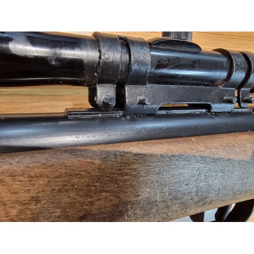 219 - A Milbro G25 .22 air rifle in good working condition fitted with a barnett 3x-7x20 scope .
Buyer mus... 