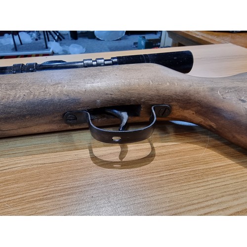 219 - A Milbro G25 .22 air rifle in good working condition fitted with a barnett 3x-7x20 scope .
Buyer mus... 