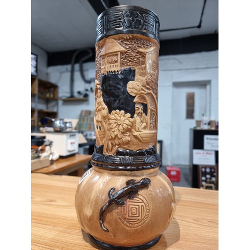 228 - A vintage Bretby tall cylindrical vase with a Japanese design and lizards to the base, has a fine ha... 