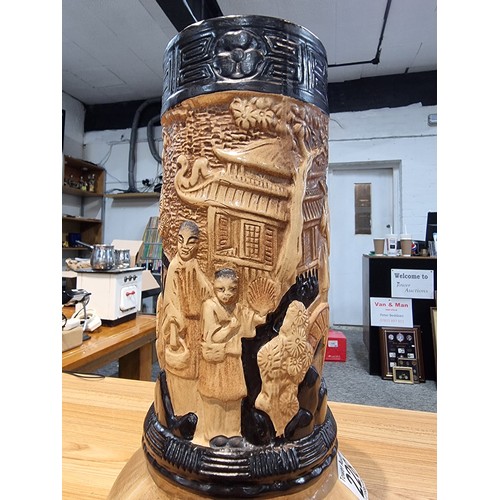 228 - A vintage Bretby tall cylindrical vase with a Japanese design and lizards to the base, has a fine ha... 