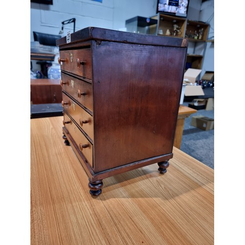 229 - A good quality antique Victorian table top chest of 4 drawers with small turned bun handles standing... 