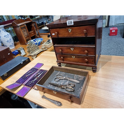 229 - A good quality antique Victorian table top chest of 4 drawers with small turned bun handles standing... 