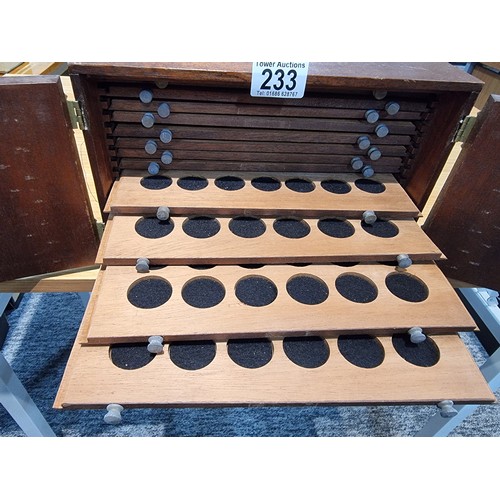 233 - A good quality vintage solid wood coin collectors storage display case with 2 lockable doors to the ... 