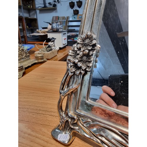 235 - A stunning large silver plated art Nouveau style table mirror featuring a lady to one side with a fl... 