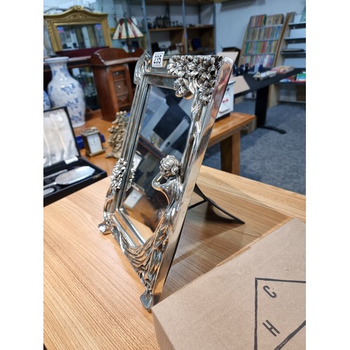 235 - A stunning large silver plated art Nouveau style table mirror featuring a lady to one side with a fl... 