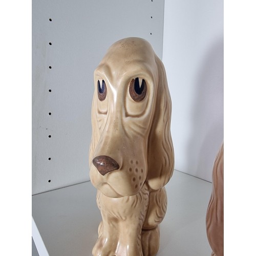 135C - 2 matching graduated sets of Sylvac ceramic dogs to include a set of 3 sad long eared dogs and a set... 