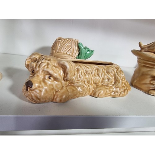 135E - A collection of 7x rare vintage Sylvac ceramic items to include a rare toothache dog 3183, a cream d... 