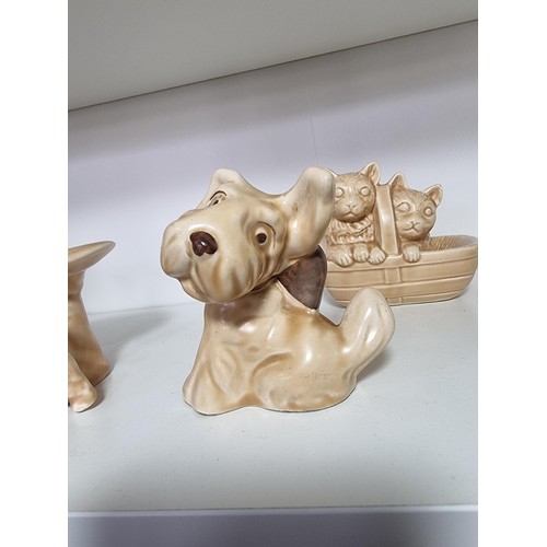 135E - A collection of 7x rare vintage Sylvac ceramic items to include a rare toothache dog 3183, a cream d... 