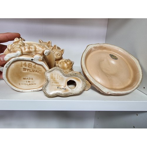 135E - A collection of 7x rare vintage Sylvac ceramic items to include a rare toothache dog 3183, a cream d... 