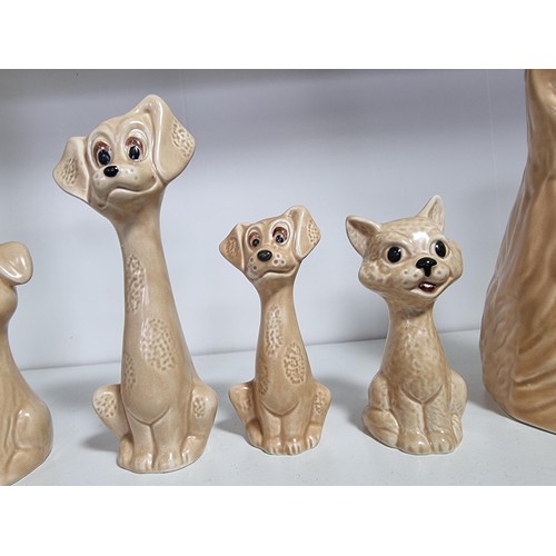 135F - 3 sets of vintage Sylvac graduated animal figures to include 2x Caricature dog figures 5295, 3x long... 