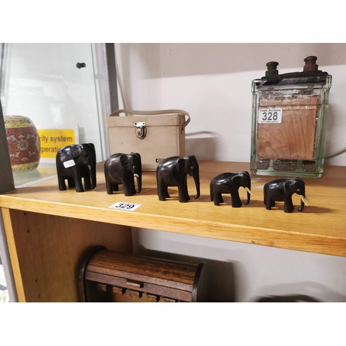329 - 5x solid ebony graduated elephant figures, some of the elephants have tusks missing
