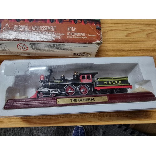 183 - A complete battery operated train set by Green Line Express along with 2 model N gauge locomotives o... 