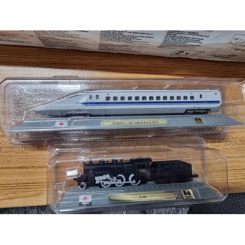 183 - A complete battery operated train set by Green Line Express along with 2 model N gauge locomotives o... 