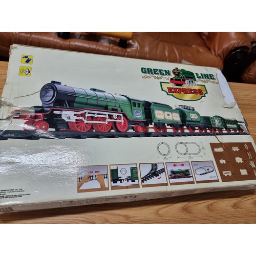 183 - A complete battery operated train set by Green Line Express along with 2 model N gauge locomotives o... 