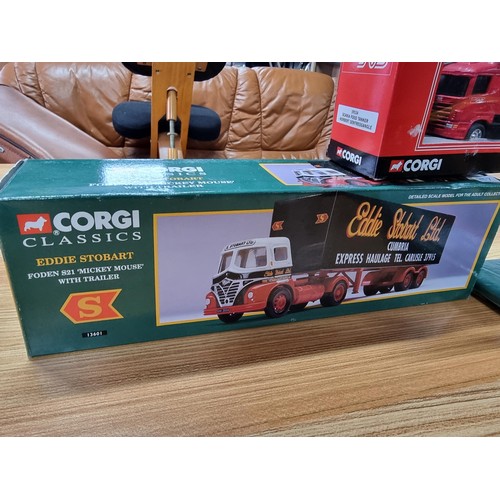 184 - 2x boxed Corgi Eddie Stobart trucks along with a Corgi Norbert Dentressangle lorry and an as new Edd... 