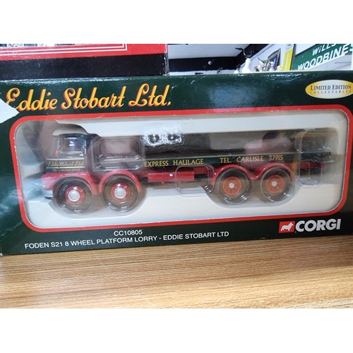 184 - 2x boxed Corgi Eddie Stobart trucks along with a Corgi Norbert Dentressangle lorry and an as new Edd... 