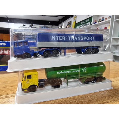 187 - A boxed Corgi Superhaulers Marmite lorry along with 3 as new diecast lorries.