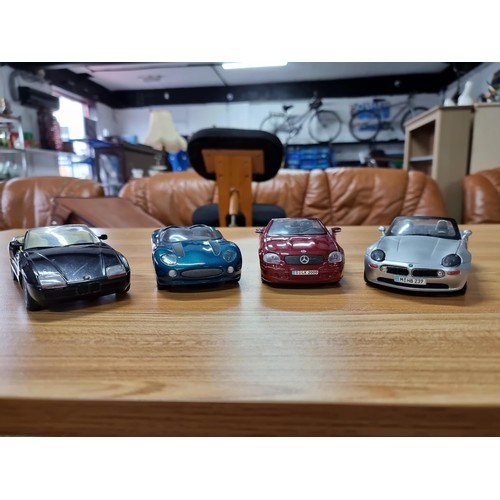 189 - A collection of 4 times large die-cast model cars all are 1/24 scale, 3 are by Maisto and 1 by Schab... 