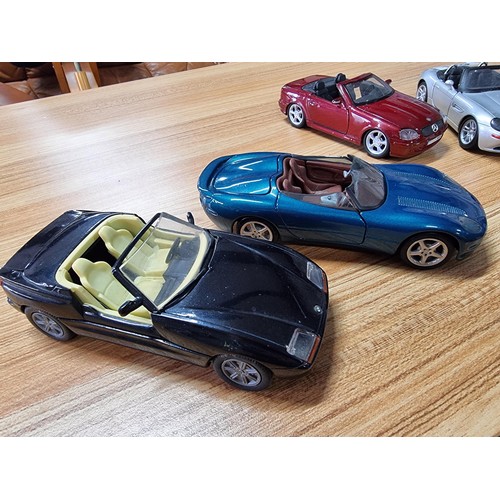 189 - A collection of 4 times large die-cast model cars all are 1/24 scale, 3 are by Maisto and 1 by Schab... 