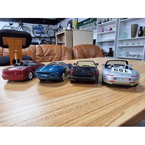 189 - A collection of 4 times large die-cast model cars all are 1/24 scale, 3 are by Maisto and 1 by Schab... 