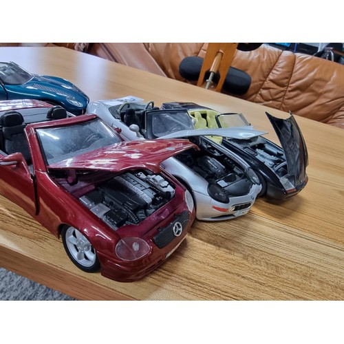 189 - A collection of 4 times large die-cast model cars all are 1/24 scale, 3 are by Maisto and 1 by Schab... 