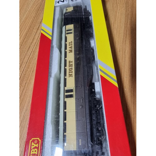 205 - A brand new in box R4526 operating mail coach 849 with line side apparatus.