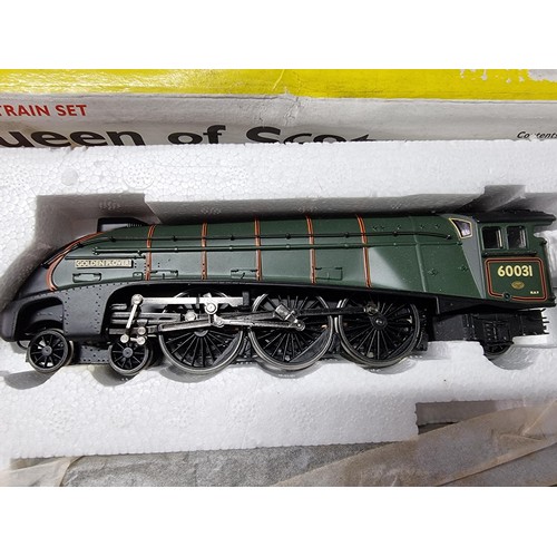 206 - A boxed as new Hornby R1024 Queen of Scots train set which includes 3 Pullman coaches, never had any... 