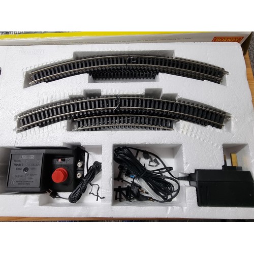 206 - A boxed as new Hornby R1024 Queen of Scots train set which includes 3 Pullman coaches, never had any... 