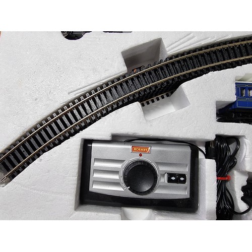 207 - A boxed as new Hornby R1155 Caledonian local train set CR 0-4-0 locomotive waggon and coach, never h... 